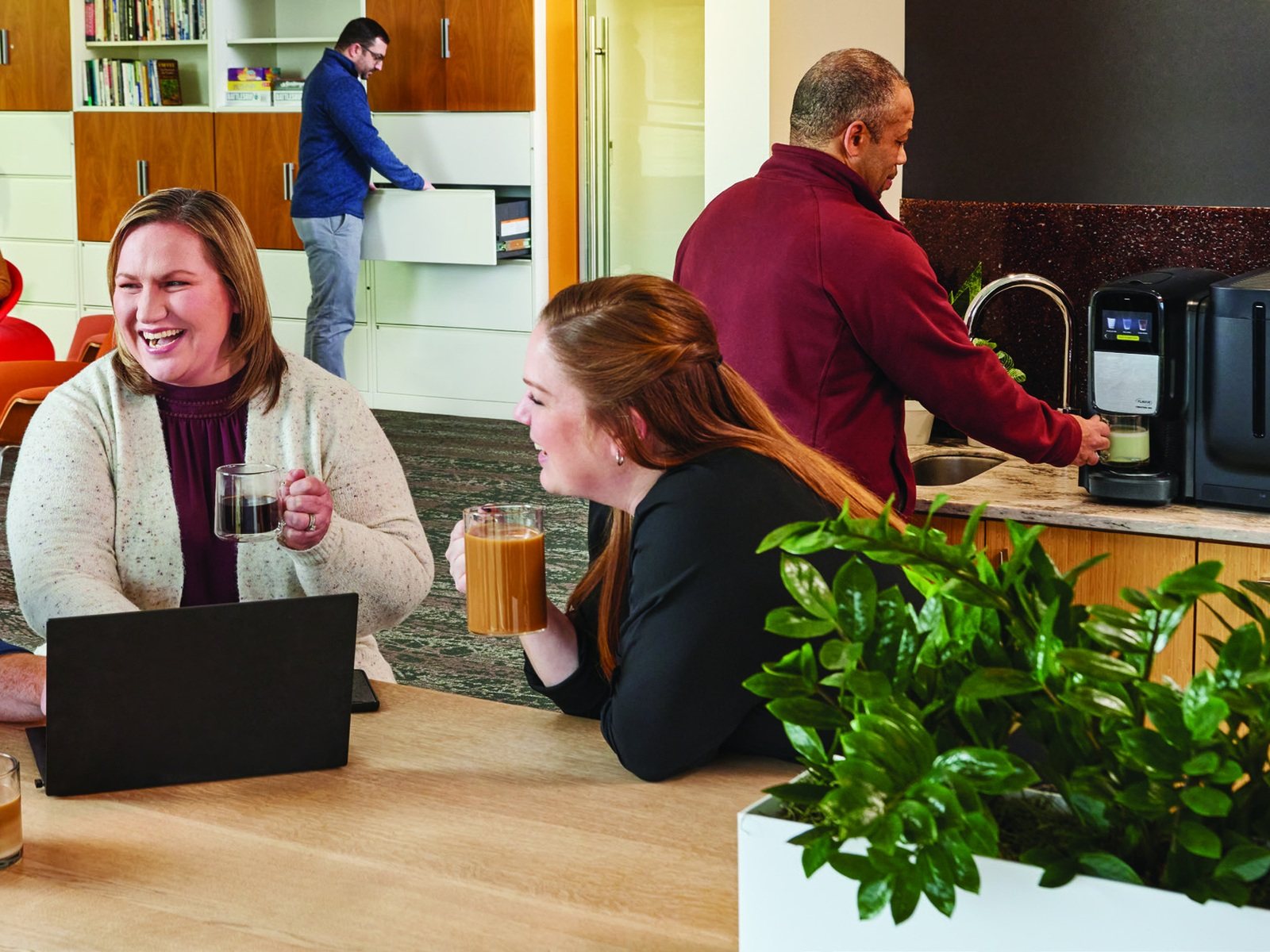 Dealership breakroom with coworkers and an Aramark bean-to-cup brewer